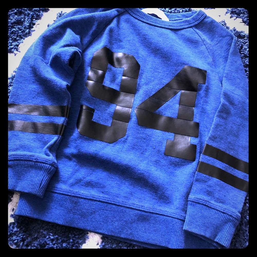 Sweater with faux leather